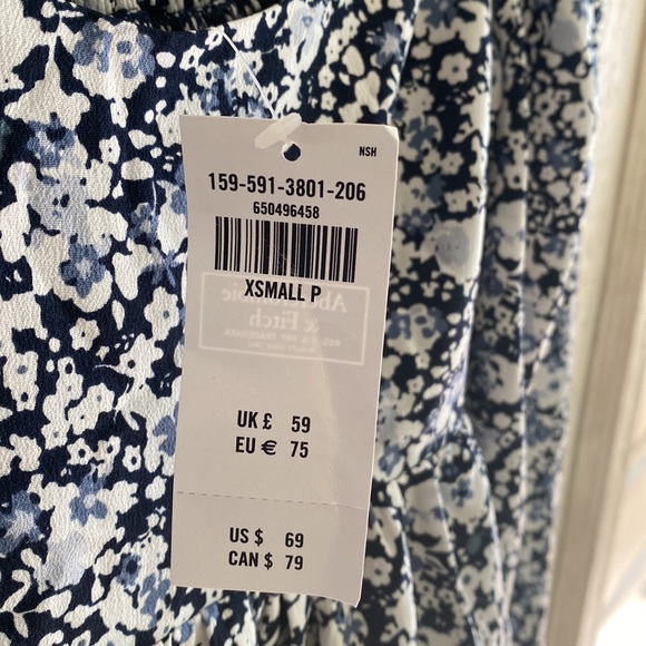 This very pretty floral dress, bought thinking I was going to wear to a wedding. - Picture 3 of 3